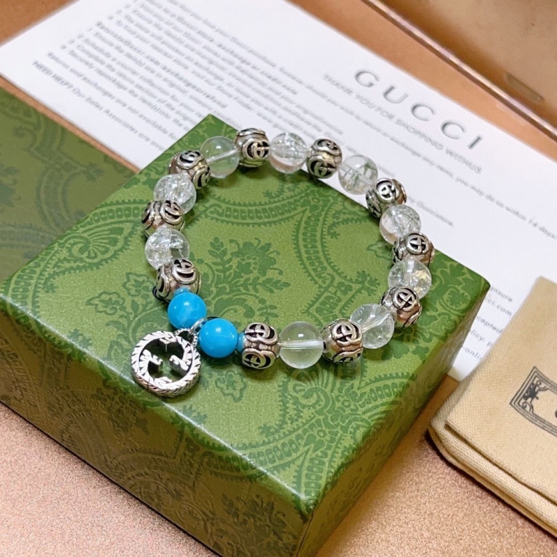 G*u*i bracelets
